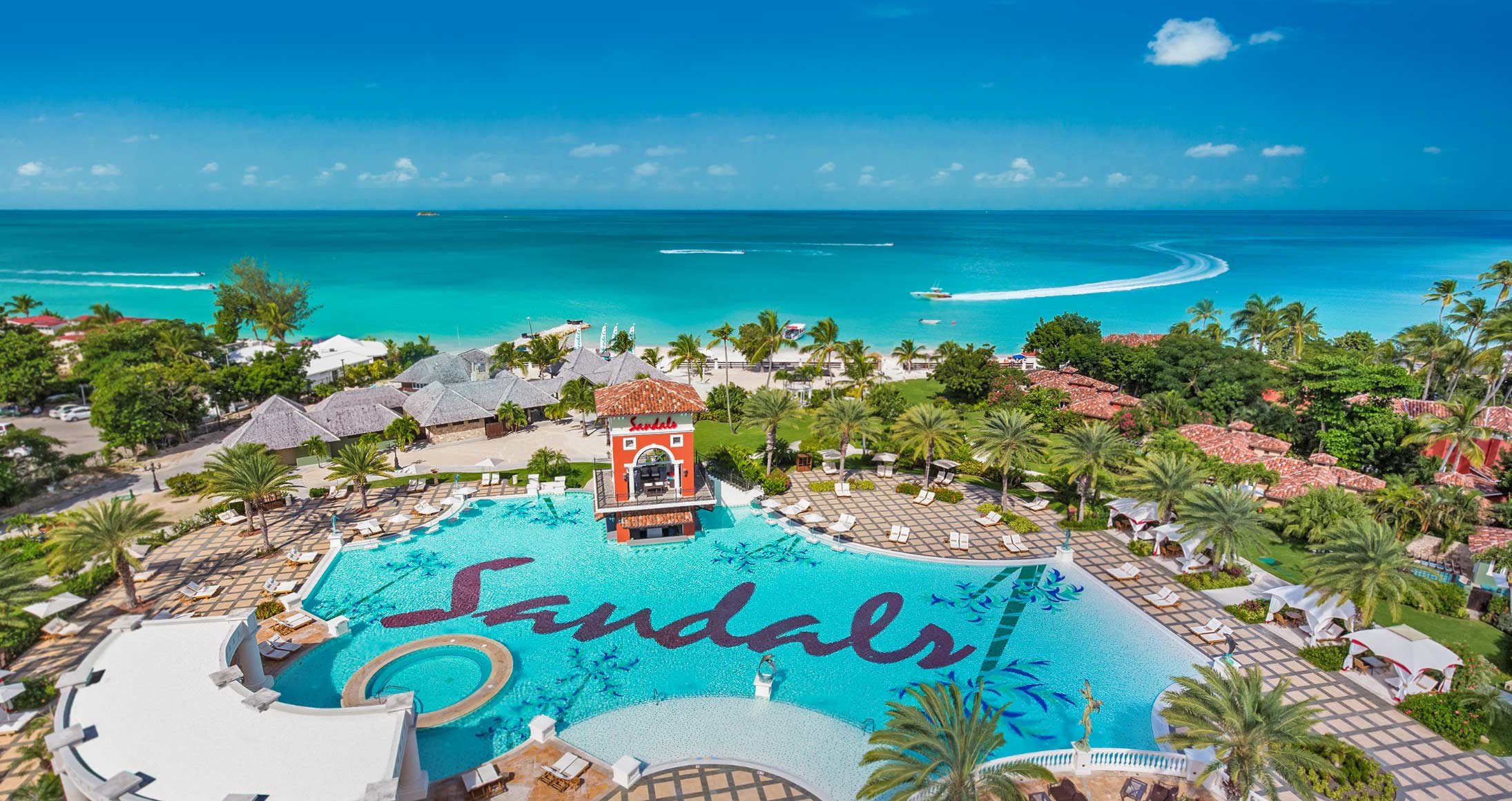 sandals-aerial-pool-beach-ocean-boat-resort